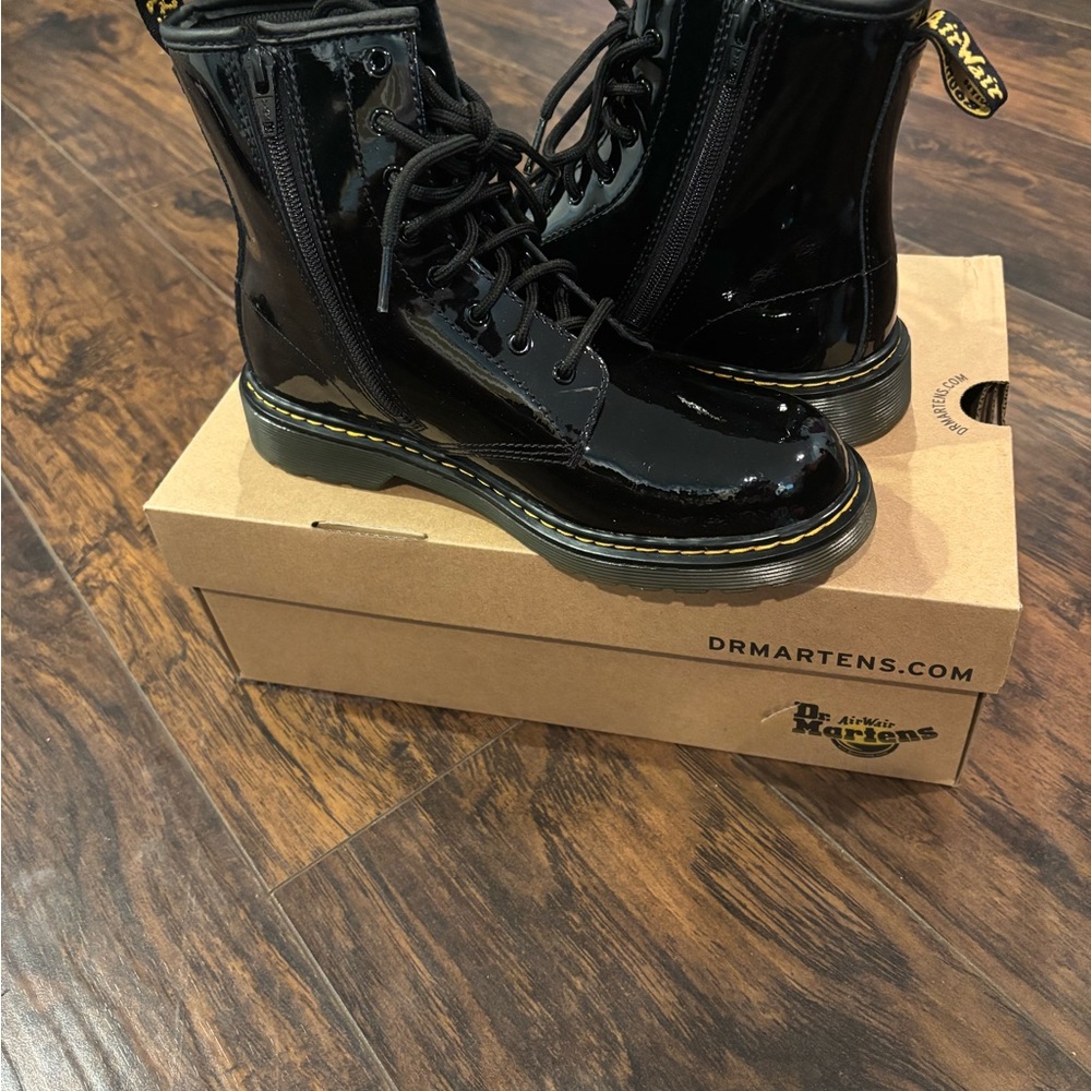 Dr. Martens Shiny Black Boots with Yellow Stitching